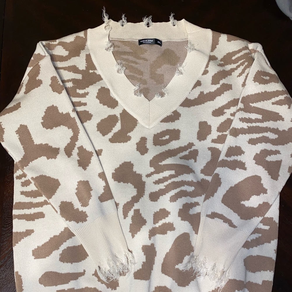 Leopard distressed sweater